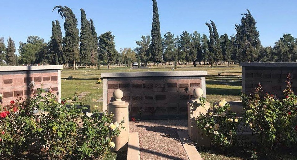 Garden-lined entrance looking into Mesa Cemetery.